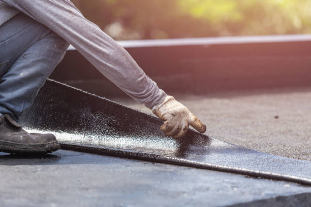 Professional Exterior Waterproofing technician working in Henderson, GA